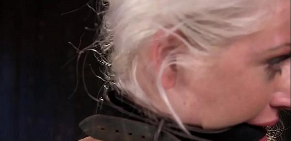  Waxed blonde in device bondage toyed